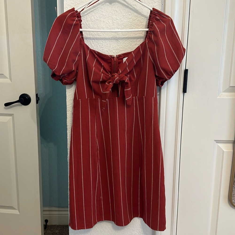 Brand- Just One Answer red/orange puffy sleeves with tie front 
Size small